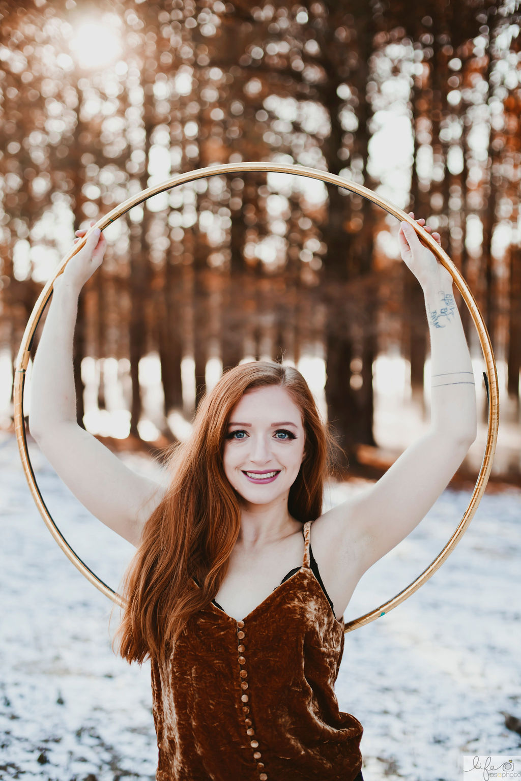 Hula Hooping Hannah posing with hoops outdoors