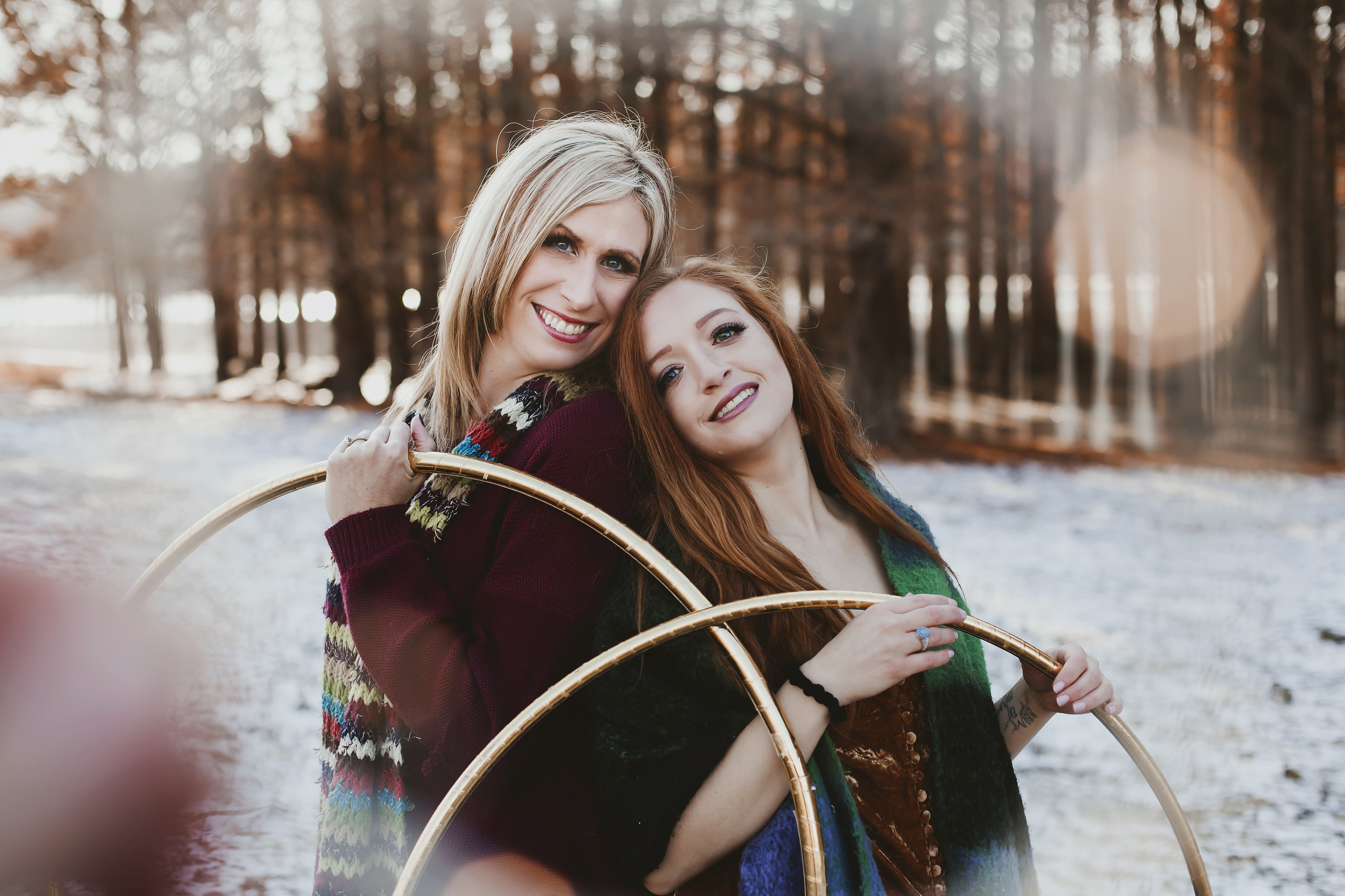 Michele McCoy and Hula Hooping Hannah posing with hoops outdoors