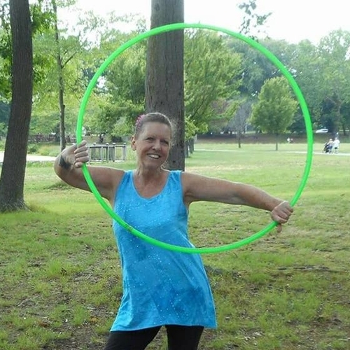 Agnes Carbone practicing hoop dance, Autumn Flow testimonial